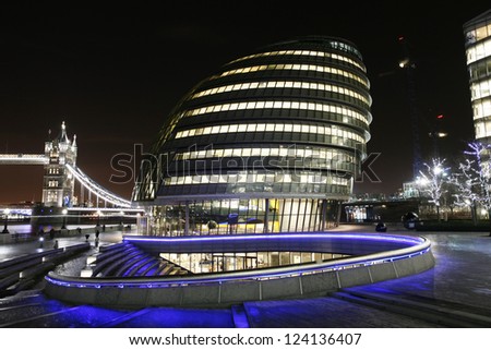 LONDON - DEC 17: London City Hall, headquarter of London Authority, on Dec 17, 2012 in London UK. This energy efficient building, designed by Norman Foster, has solar panels installed on the roof.