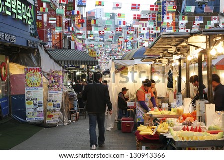 SEOUL - APRIL 21: Street view of Nam Dae Mun Market, crowd present, on April 21, 2011, Seoul, South Korea. This is the oldest, dates back to 1414, and largest traditional market in South Korea.