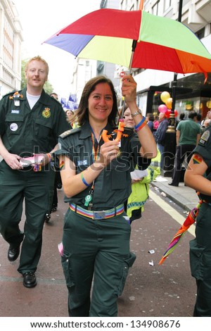LONDON - JULY 7: People take part in London\'s Gay Pride, 2012 Worldpride on July 7, 2012 in London, UK, estimated 25,000 people took part in the march, Parade to support gay rights.