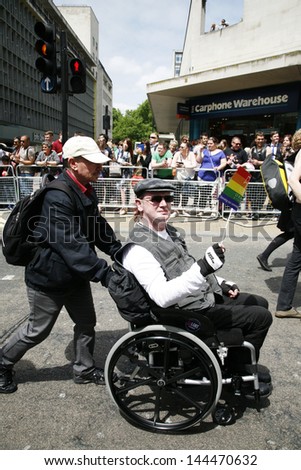 LONDON - JUNE 29: People, on wheelchair,  take part in London\'s Gay Pride on June 29, 2013 in London, UK, estimated 25,000 people took part in the march, Parade to support gay rights.