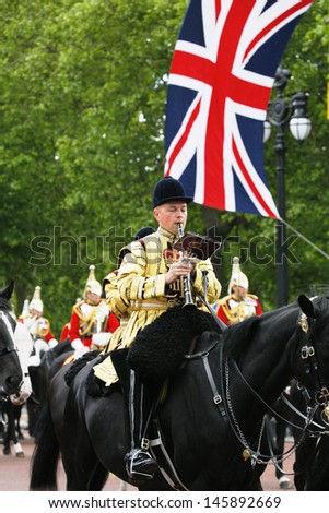 LONDON - JUNE 15, 2013: Queen\'s Bands at Queen\'s Birthday Parade. Queen\'s Birthday Parade take place to Celebrate Queen\'s Official Birthday in every June in London.
