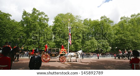 LONDON - JUNE 15: The parade marching at Queen\'s Birthday Parade on June 15, 2013 in London, UK. Queen\'s Birthday Parade take place in every June in London.