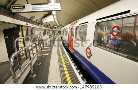 LONDON - NOV 10 : Inside view of London Underground, oldest underground railway in the world, covering 402 km of tracks, on Nov 10, 2012 in London, UK.