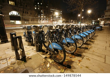 LONDON - NOV 23: Rental bicycles on Nov 23, 2012 in London, UK. London\'s bicycle sharing scheme, launched with 6000 bikes, 400 docking stations on 30 July 2010 to help ease traffic congestion.