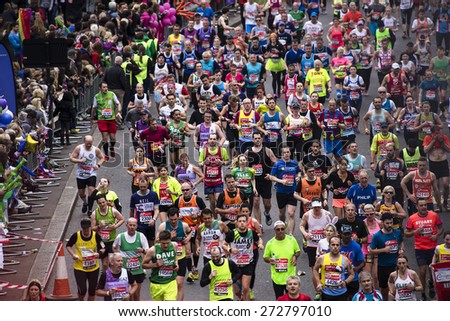 LONDON - APRIL 26: Runners in the London Marathon on April, 26, 2015 in London, UK. The London Marathon is next to New York, Berlin, Chicago and Boston to the World Marathon Majors, Champions League