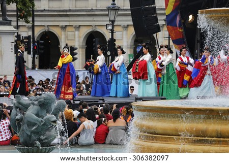 LONDON - AUGUST 9: Korean ethnic dancers perform,Royal Wedding Dance, in Korean Festival at Trafalgar Square on August 9, 2015 in London, UK.