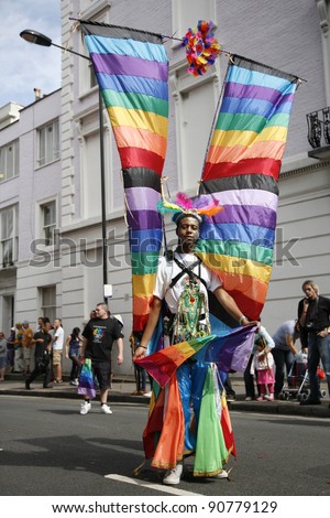 LONDON - AUGUST 29: Performers take part in the second day of Notting Hill Carnival, largest in Europe, on August 29, 2011 in London, UK. Carnival takes place over two days in every August.