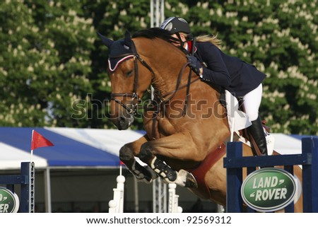 WINDSOR - MAY 11: Performers take part at Royal Windsor Horse Show, largest equestrian Show in the UK, on May 11, 2006 in Windsor, UK. The event has been running for over 65 years at Windsor Castle.