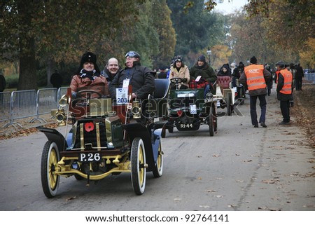 LONDON - NOVEMBER 06: London to Brighton Veteran Car Run participants, Dennis, 1902,  leaving Hyde Park, the event starts at 7:00am in Hyde Park on November 06, 2010 in London, UK.