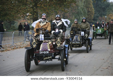 LONDON - NOVEMBER 07: London to Brighton Veteran Car Run participants, De Dion Bouton, 1903, leaving Hyde Park, the event starts at 7:00am in Hyde Park on November 07, 2010 in London, UK.