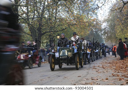 LONDON - NOVEMBER 07: London to Brighton Veteran Car Run participants leaving Hyde Park, the event starts at 7:00am in Hyde Park on November 07, 2010 in London, UK.