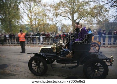 LONDON - NOVEMBER 07: London to Brighton Veteran Car Run participants leaving Hyde Park, the event starts at 7:00am at the Serpentine Road in Hyde Park on November 07, 2010 in London, UK.