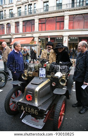 LONDON - NOVEMBER 06: Display of vintage cars, Peugeot, 1903, on November 06, 2010 in London, UK.  Some participants display their old cars in London\'s Regent Street on the day before the Run.