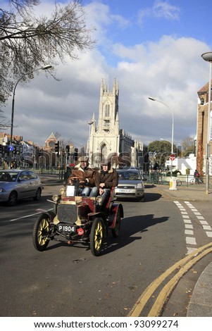 LONDON - NOVEMBER 07: London to Brighton Veteran Car Run participants, Peugeot, 1904, arriving in Brighton on November 07, 2010 in London, UK. Event starts at 7:00am in Hyde Park, London.
