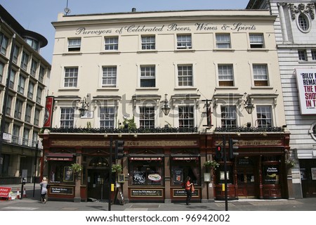 LONDON - MAY 25: Exterior of pub, for drinking and socializing, focal point of the community, on May 25, 2010, London, UK. Pub business, now about 53,500 pubs in the UK, has been declining every year