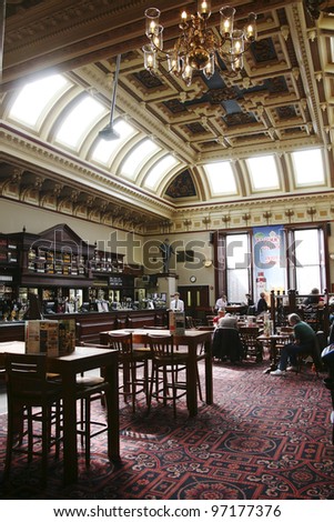EDINBURGH - JULY 23: Interior of pub, for drinking and socializing, focal point of the community, on July 23, 2010, Edinburgh, UK. Pub business, about 53,500 pubs in UK, has been declining every year