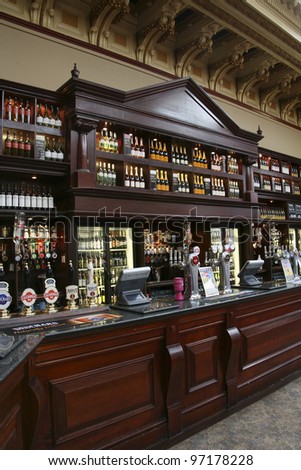 EDINBURGH - JULY 24: Interior of pub, for drinking and socializing, focal point of the community, on July 24, 2010, Edinburgh, UK. Pub business, about 53,500 pubs in UK, has been declining every year