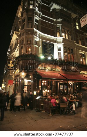 LONDON - NOV 6: Exterior of pub, for drinking and socializing, focal point of the community, on Nov 6, 2010, London, UK. Pub business, now about 53,500 pubs in the UK, has been declining every year