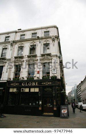 LONDON - MAY 30: Exterior of pub, for drinking and socializing, focal point of the community, on May 30, 2010, London, UK. Pub business, now about 53,500 pubs in the UK, has been declining every year
