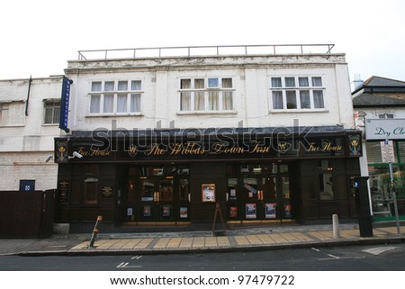 LONDON - DEC 14: Exterior of pub, for drinking and socializing, focal point of the community, on Dec 14, 2010, London, UK. Pub business, now about 53,500 pubs in the UK, has been declining every year