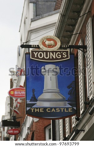 LONDON - MAY 27: English pub sign, Public house, known as pub, is focal point of the community, on May 27, 2010, London, UK. Pub business, now about 53,500 pubs in UK, has been declining every year