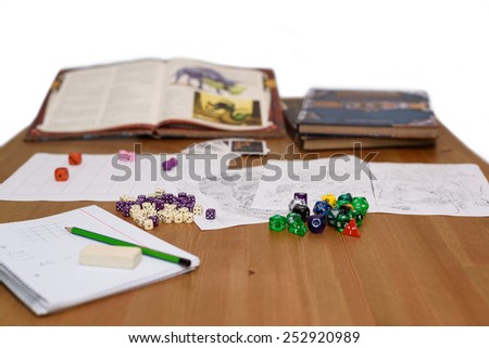 role playing game set up on table isolated on white background - stock photo