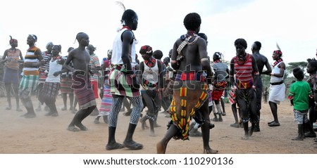 OMO VALLEY, ETHIOPIA-JAN 28: Hammer tribe preforming traditional dance, the ethnic groups in the Omo valley could disappear because of Gibe III hydroelectric dam on Jan 28,2012 in Omo Valley,Ethiopia.