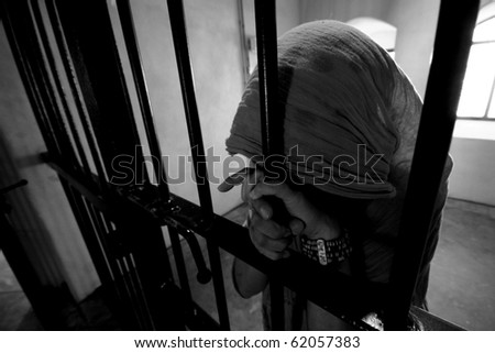 Girl behind bars