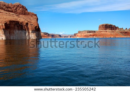 Canyon walls go on and on as you traverse Lake Powell.  Red sandstone cliffs line each side.