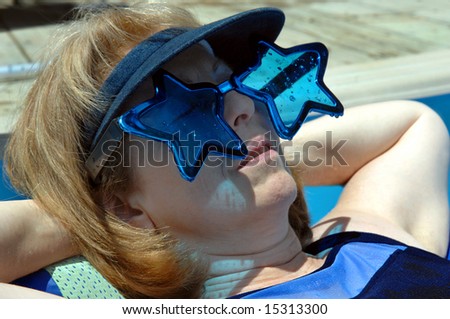 stock-photo-everyone-wants-to-be-a-star-this-woman-wears-some-blue-tinted-sunglasses-with-star-shaped-15313300.jpg