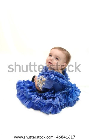 stock photo : Baby is dressed in pageant dress in periwinkle blue.