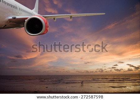 Passenger Jet Plane Flying Above tropical Island for travel concept