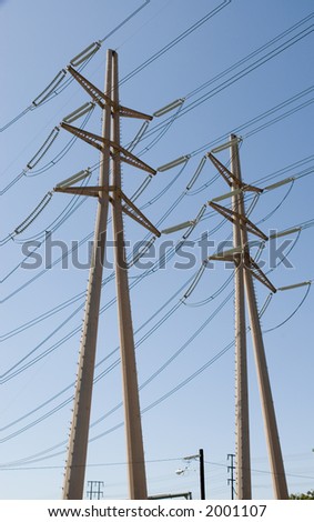 high voltage power tower and electricity wires with blue sky