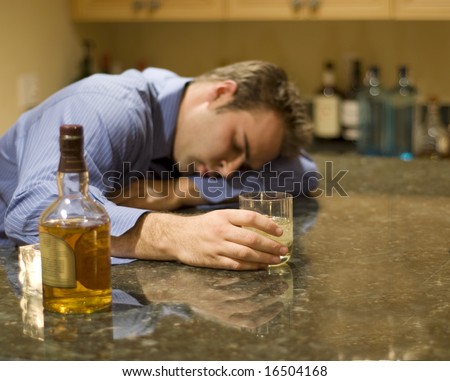 young man passed out from drinking alcohol