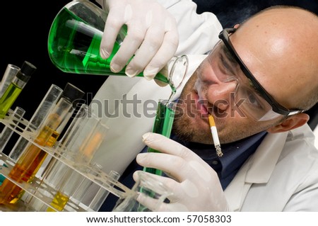 Crazy mad Scientist pouring chemicals in a laboratory