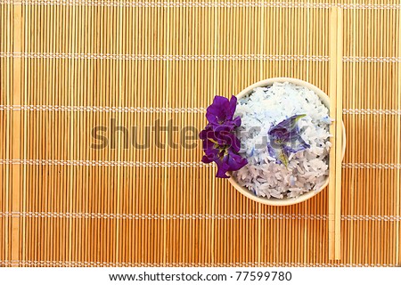 Rice cooked with blue butterfly pea on bamboo pad