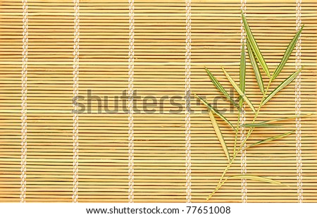 Bamboo leaves on bamboo pad