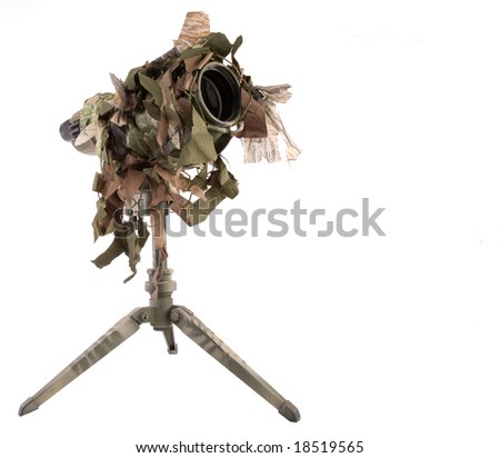 Heavily camouflaged military style telescope with tripod.