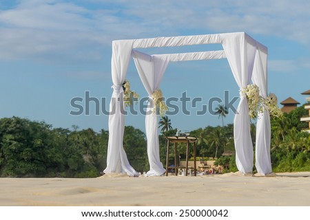 beautiful wedding arch, cabana on sand beach, outdoor beach wedding