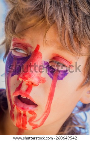 young kid - boy - with painted face, child zombie face art