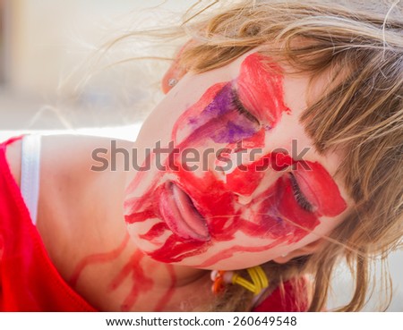 young kid - girl - with painted face, child zombie face art