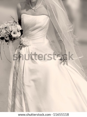 close up of running bride with bouquet, sepia
