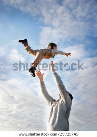 flying child on sky background