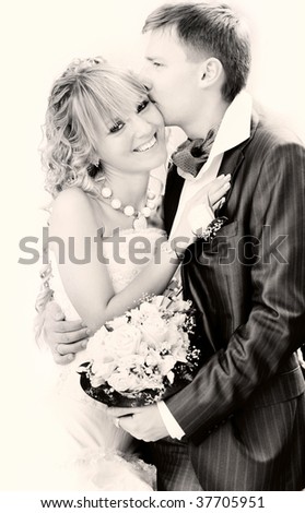 sepia-toned portrait of happy couple on their wedding day