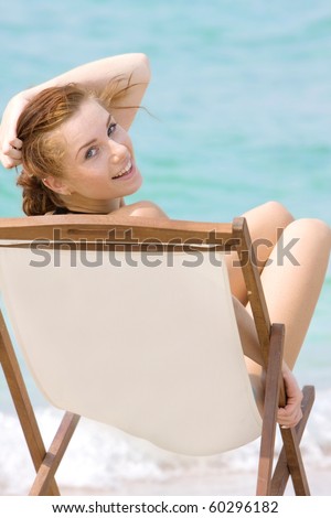 stock photo young girl relaxing on beach