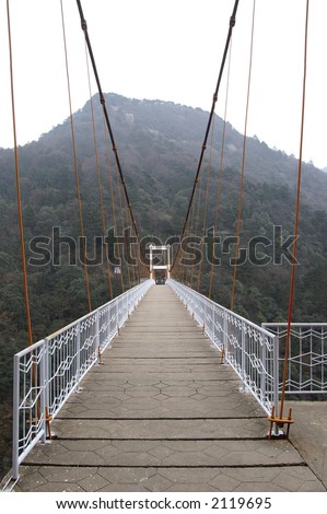 bridge across canyon, in China\'s famous beauty spot Lushan