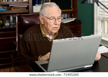 Senior working on a laptop