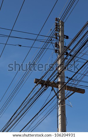 A tangle of cables and wires in Thailand, Asia