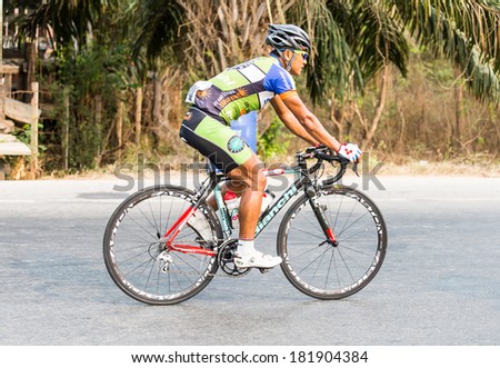 CHAINAT, THAILAND - MARCH 9 : Seree Ruangsiri riding a Road bike at Thailand Championship 2014 Race 3 on March 9, 2014 at Khaoprong  in Chainat, Thailand.