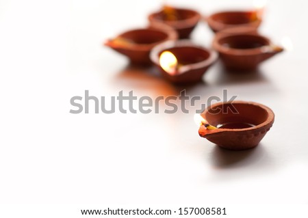 Diwali Diyas on a isolated white background Diwali Diyas on a isolated white background